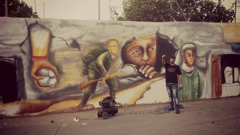 جدارية فنية بريشة الفنان سامر الديك على جدران مخيم قلنديا / فلسطين
