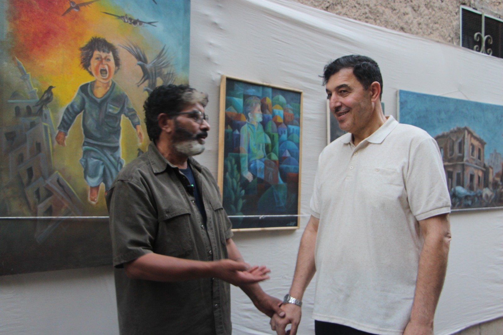 موسوعة المخيمات الفلسطينية تزور معرض: غزة يا جرحنا المفتوح، للفنان التشكيلي علي جروان ولمؤسسة كوشان، بعدسة لين محمد