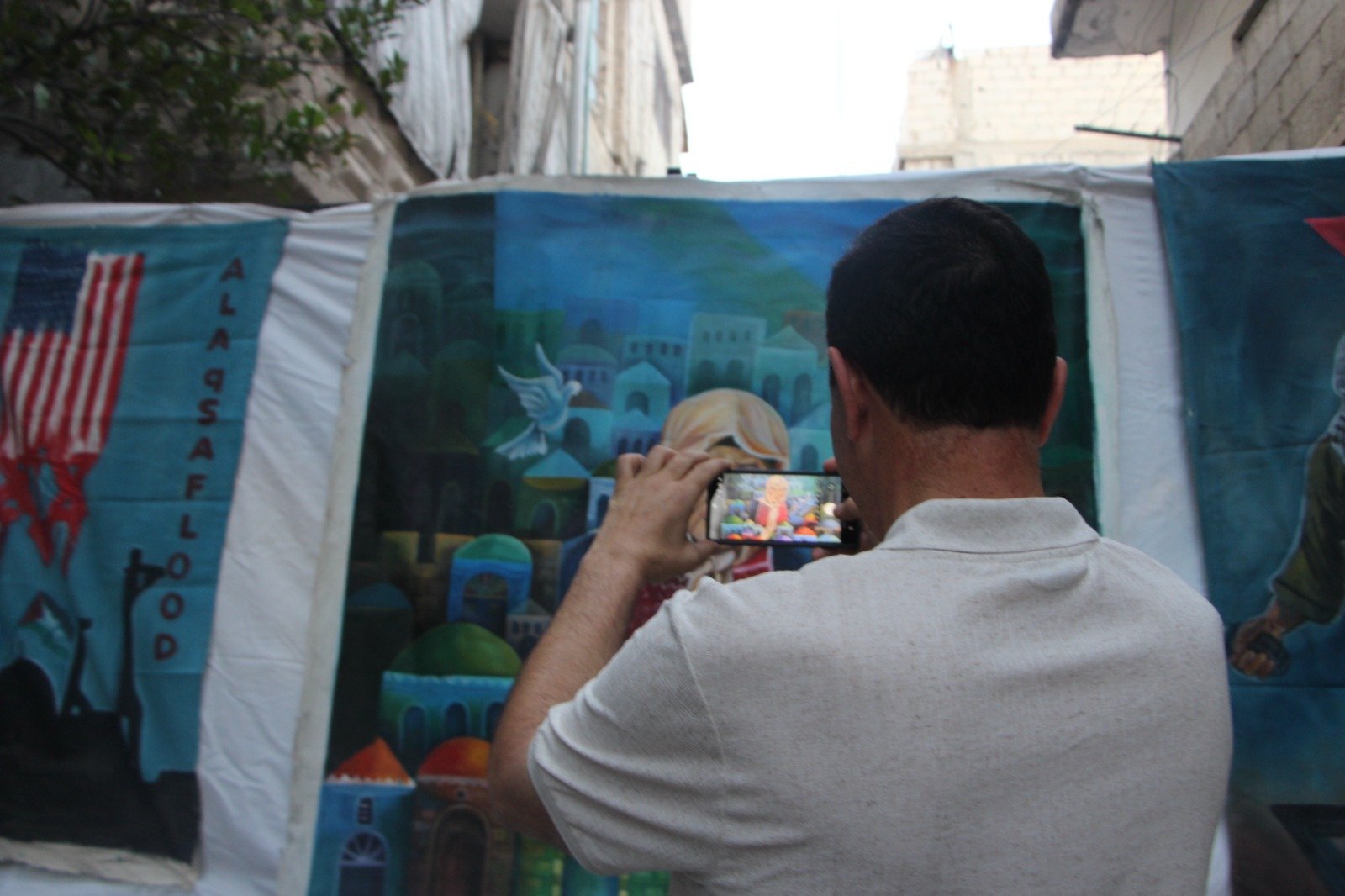 موسوعة المخيمات الفلسطينية تزور معرض: غزة يا جرحنا المفتوح، للفنان التشكيلي علي جروان ولمؤسسة كوشان، بعدسة لين محمد