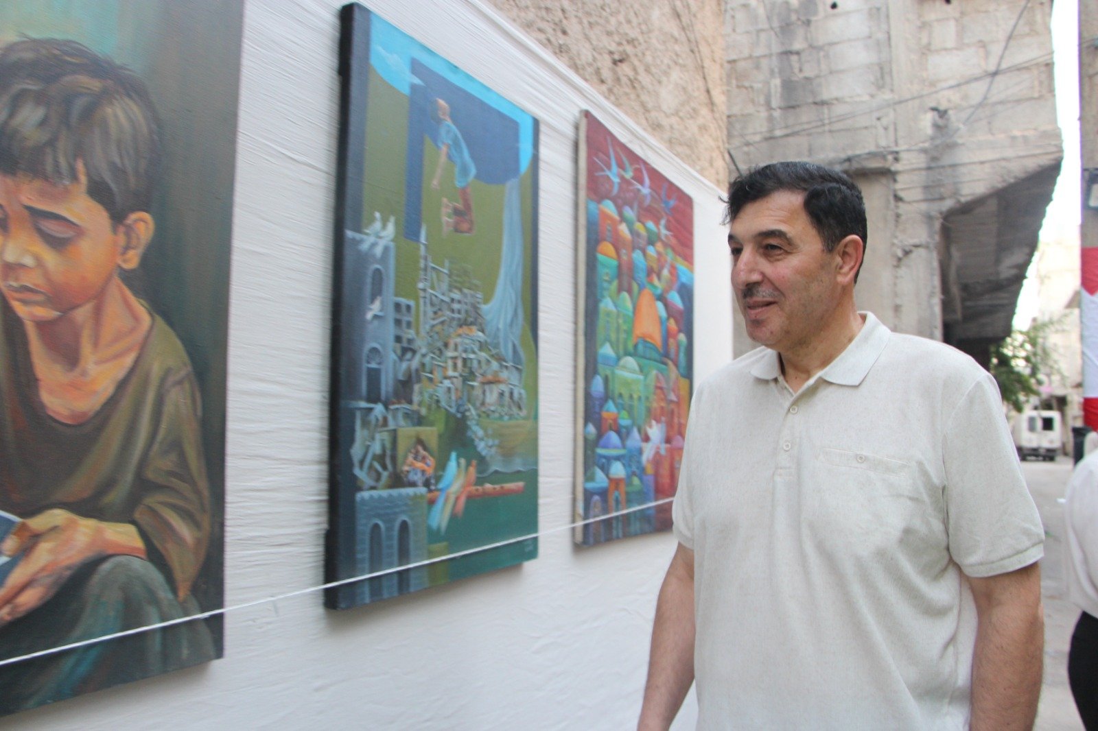 موسوعة المخيمات الفلسطينية تزور معرض: غزة يا جرحنا المفتوح، للفنان التشكيلي علي جروان ولمؤسسة كوشان، بعدسة لين محمد